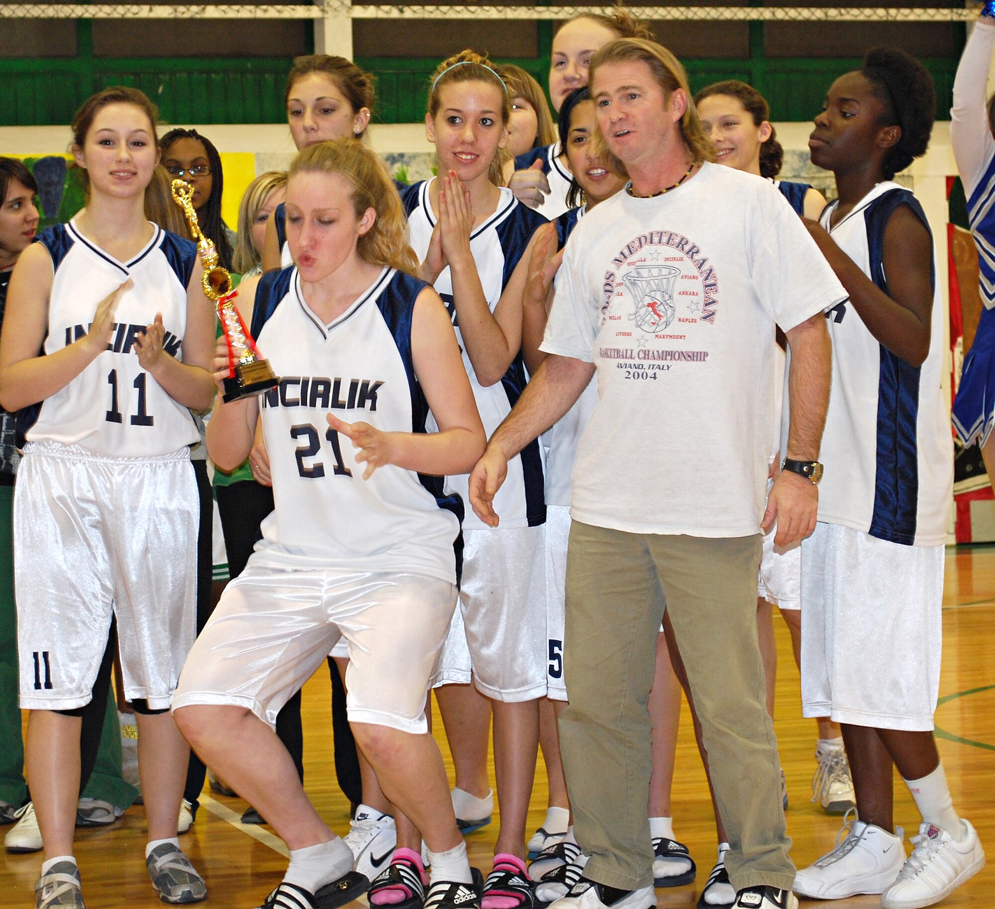 The Incirlik Unit School Hodjas girls basketball team celebrates after winning first place in a tournament, Jan.23. (Photo/Col. Lawrence Gray)