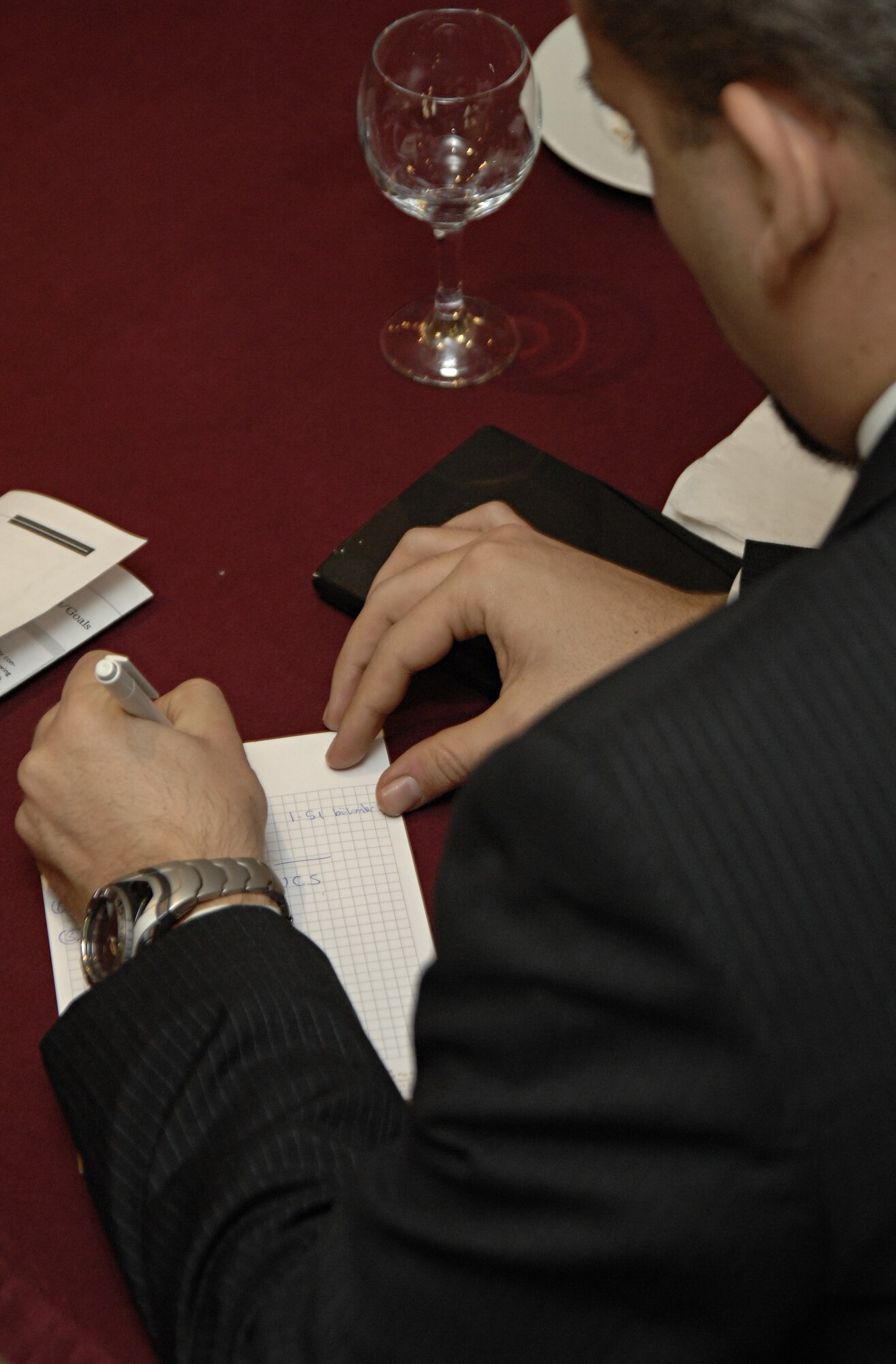 A potential vendor takes notes about how to become a foreign contractor with the United States Air Force during the 39th Contracting Squadron Vendor Day, Jan. 22. The purpose of the event is to increase competition between base vendors and inform potential new vendors about the process of becoming a contractor for Incirlik Air Base. (U.S. Air Force photo/Senior Airman Benjamin Wilson)