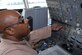 SOUTHWEST ASIA - Master Sgt. Terence Jackson, 908 Expeditionary Air Refueling Squadron, flight engineer, conducts pre-flight checks ensure all lights and aircraft systems function and work properly, Jan 23. Sergeant Jackson reached a milestone of 10,000 flight hours. Sergeant Jackson is deployed from the 305th Air Mobility Wing, McGuire AFB and is from Grand Rapids, Mich. (U.S. Air Force photo by Captain Jennifer M. Pearson) (Released)
