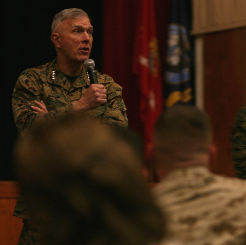 Gen. James T. Conway, commandant of the Marine Corps, speaks during the 2nd Supply Battalion, 2nd Marine Logistics Group, single and married Marine pre-deployment brief, here, Jan. 26.  The commandant and Sgt. Maj. Carlton W. Kent, sergeant major of the Marine Corps, attended the event to discuss the overall importance of promoting family readiness within commands.