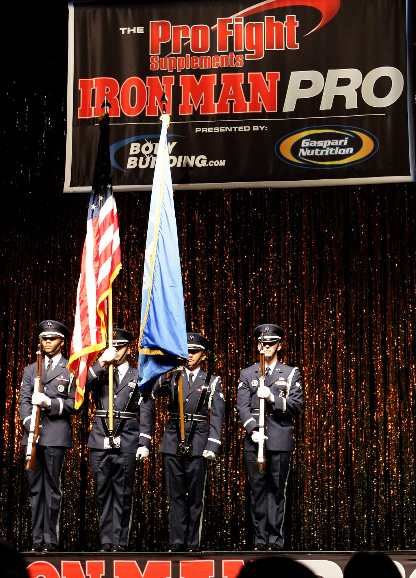 Members of the Edwards Blue Eagles Honor Guard present the colors during the 2009 Pro Fight Supplements Los Angeles Fitness Expo and Iron Man Pro XX Jan 24 at the Los Angeles Convention Center in Los Angeles. The Iron Man Pro is the first men's professional bodybuilding contest of the year. (Photo by Roland Balik)