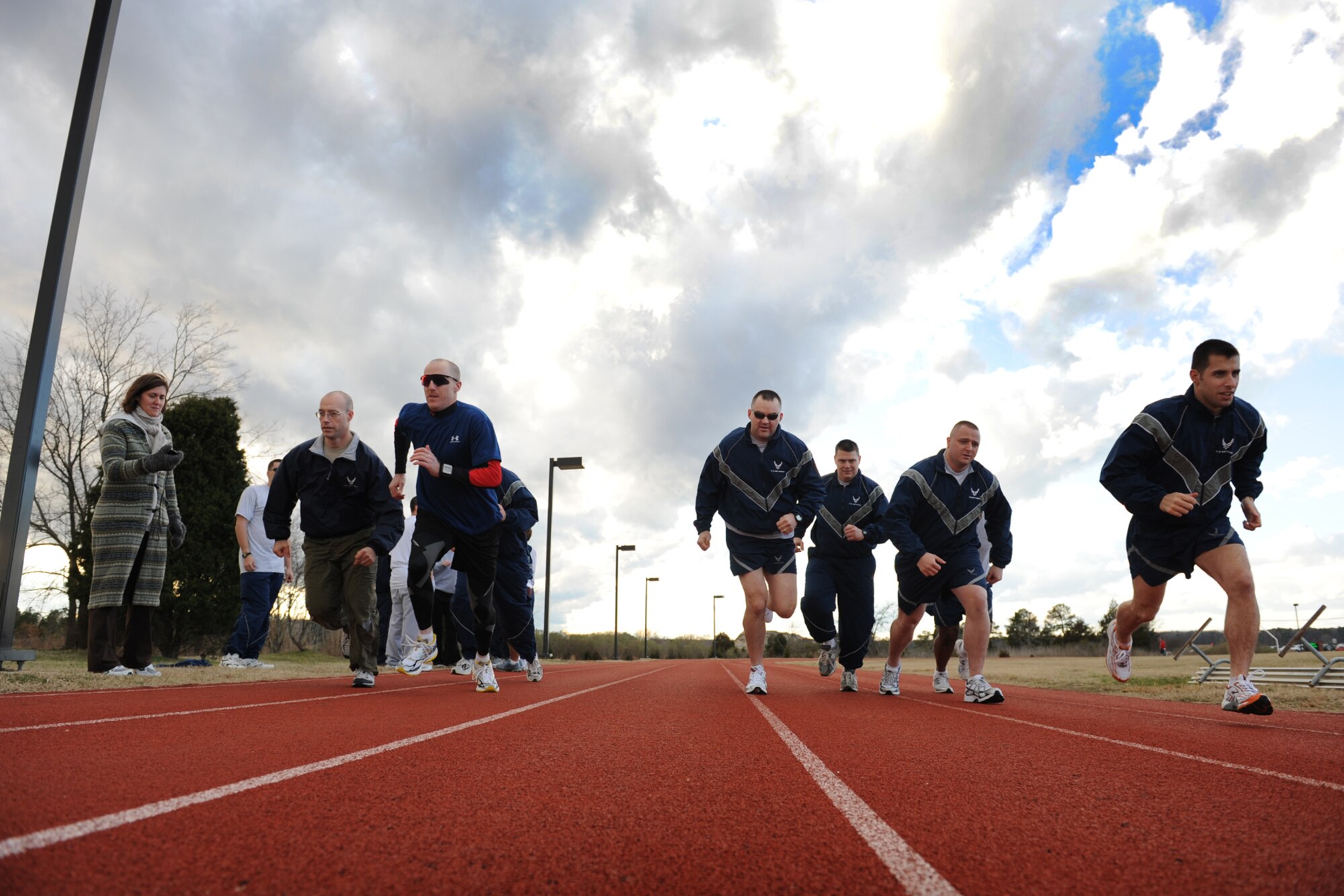 LANGLEY AIR FORCE BASE, Va. -- Airmen begin the running portion of the running clinic Jan. 8.  The running clinic is held monthly to help Airmen improve their one and a half mile run time.  Participants of the clinic spend about three hours between the classroom and running track.  The next running clinic will be held on Feb. 12, at the Health and Wellness Center.  To sign up call 764-6321.  (U.S. Air Force photo/Senior Airman Vernon Young)