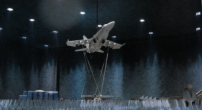 The 772nd Test Squadron, together with Naval Air Weapons Station China Lake, conducts full antenna pattern testing on a Navy F/A-18 Hornet at the Benefield Anechoic Facility here Jan. 22. The purpose of the antenna test is to evaluate how the entire F-18 system affects antenna pattern and what parts of the aircraft can significantly change the pattern.The team completed testing Jan. 22. (Air Force photo by Senior Airman Julius Delos Reyes)