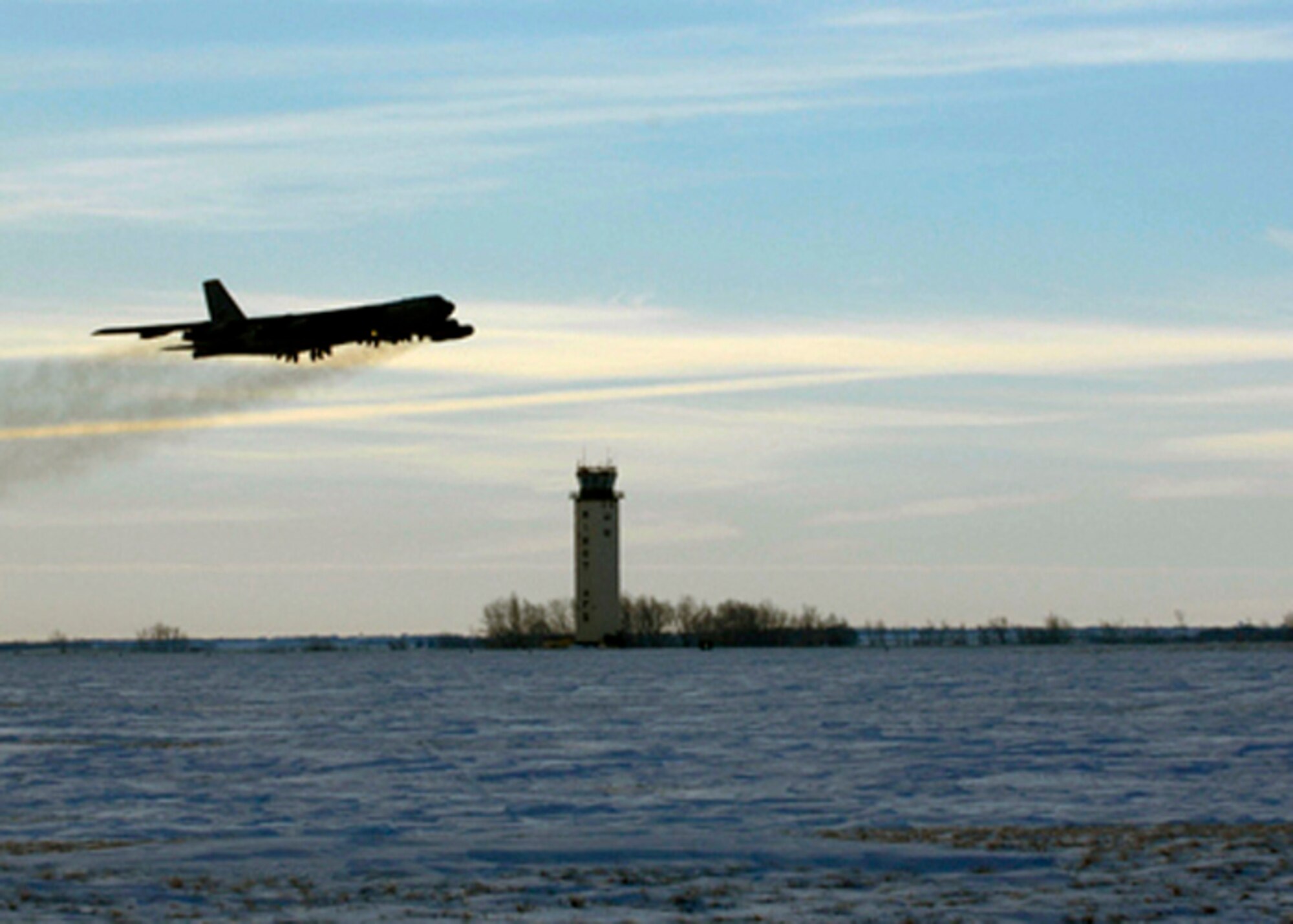 MINOT AIR FORCE BASE, N.D. -- After years of service, a B-52H Stratofortress, tail number 61-0027, leaves Minot AFB on its last flight here Jan. 21. The B-52 is destined for retirement at the Aerospace Maintenance and Regeneration Group (AMARG) at Davis-Monthan AFB, Ariz., more commonly known as the Boneyard. (U.S. Air Force photo by Staff Sgt. Keith Ballard)