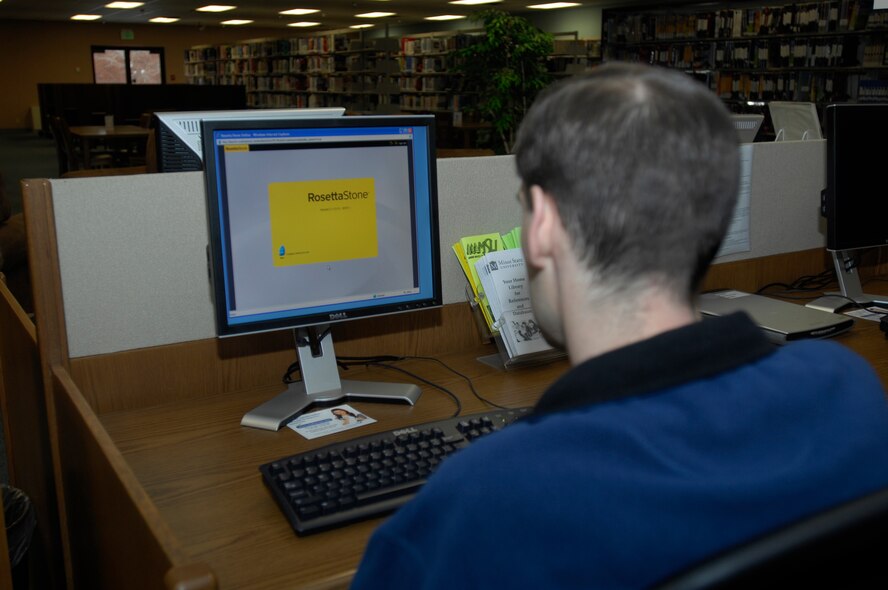 MINOT AIR FORCE BASE, N.D. -- Troy Luschen, a technical information specialist with the 5th Force Support Squadron, logs on to the Rosetta Stone website at the base library in the Francis X. Deignan Center here Jan. 7. Air Combat Command libraries offer the Rosetta Stone language learning program free of charge to all base personnel. For more information on the program, contact the base library at 723-3344. (U.S. Air Force photo by Airman 1st Class Jesse Lopez)
