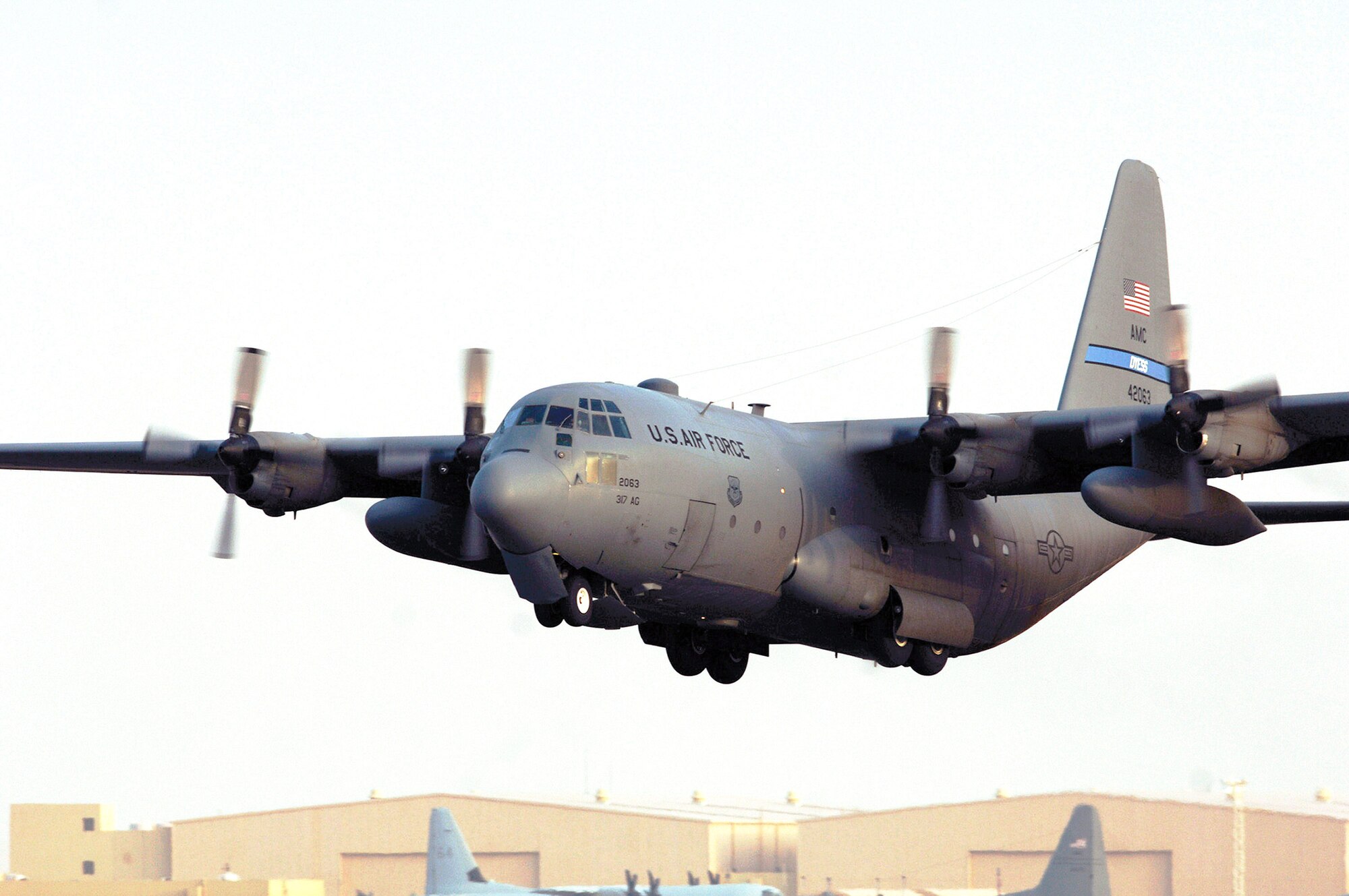 An Air Force C-130 Hercules takes off for an airlift mission from a base in Southwest Asia. More than 130 airlift sorties were flown by coalition aircraft throughout the area of responsibility. (U.S. Air Force photo)