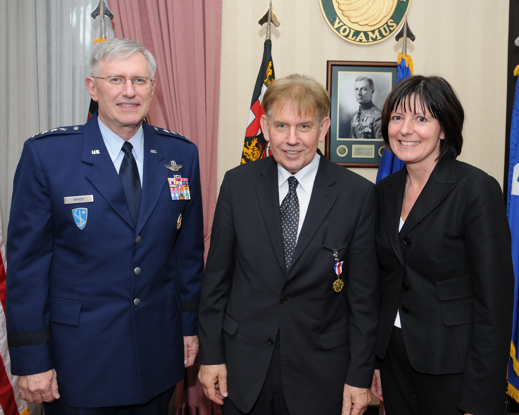 General Roger E. Brady, U.S. Air Forces in Europe commander, presents the USAFE Medal of Distinction certificate to Dr. Richard Auernheimer, former State Secretary of the Ministry for Labor, Social Affairs, Health, Family and Women for the Rhineland-Palatinate State Government, Jan. 22, 2009, at Ramstein Air Base for his unrelenting engagement on behalf of USAFE during the last nine years. Also present at the ceremony, Malu Dreyer (pictured above), Minister for Labor, Social Affairs, Health, Family and Women for the Rhineland-Palatinate State Government, thanked Dr. Auernheimer for his support of USAFE's mission accomplishment. Dr. Auernheimer dedicated his efforts to the active promotion of German-American cooperation through better communication and interaction, contributing to the social, personal and cultural exchanges between all parties. (U.S. Air Force photo by Airman 1st Class Caleb Pierce)