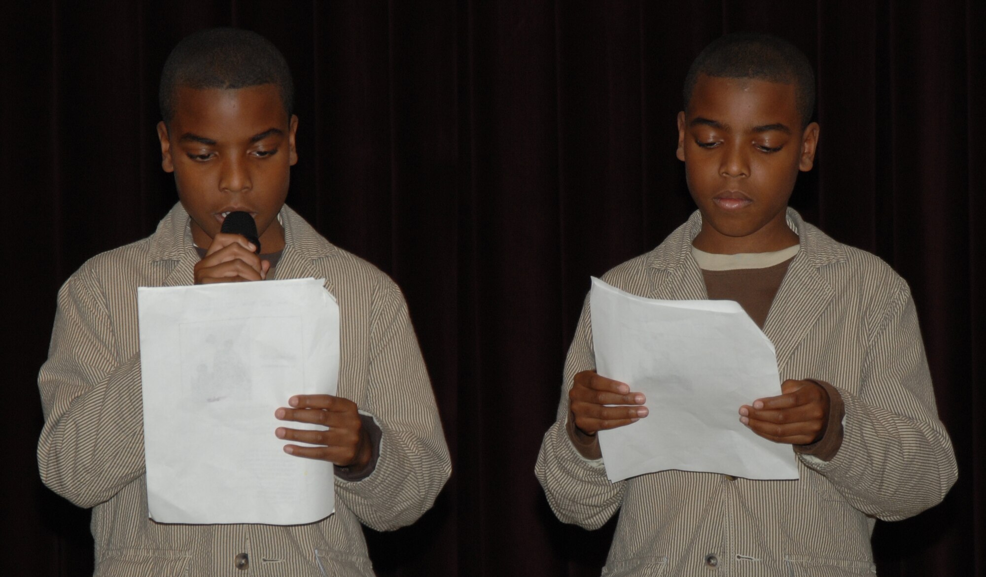 Kamani and Kweisi Satterwhite read the poem “Standing Tall” by Jamie McKenzie during the Martin Luther King Jr. observance luncheon Jan. 20, at Incirlik Air Base, Turkey. The annual luncheon celebrated the work of Martin Luther King Jr. with a slideshow, song performances, and a speech highlighting his life and work. (U.S. Air Force photo/1st Lt. Nick Plante)