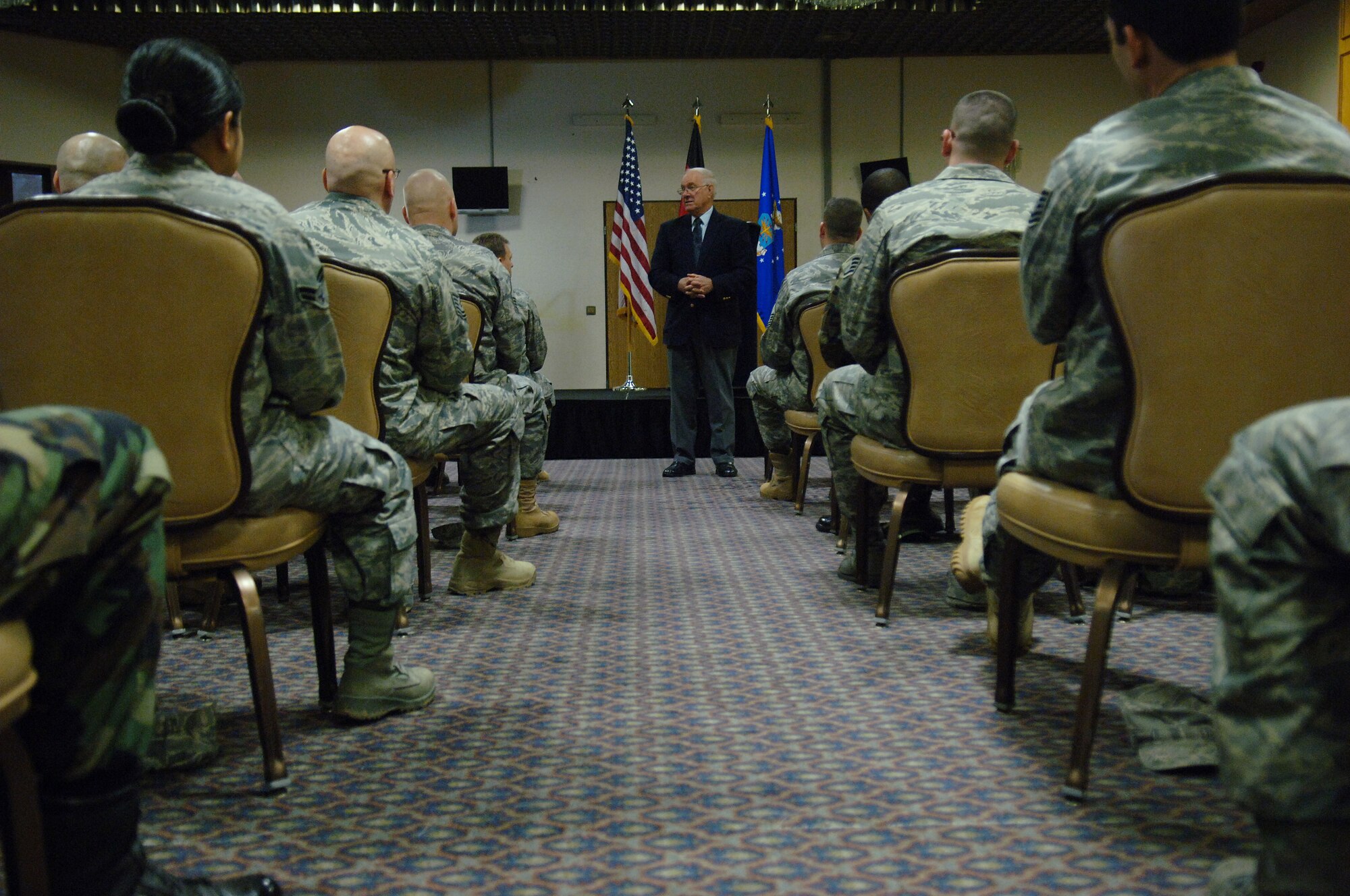 Retired Chief Master Sgt. of the Air Force Sam E. Parish talks to military members during a commander's call at Sembach Air Base, Germany, Jan. 22, 2009. (U.S. Air Force photo by Senior Airman Levi Riendeau)