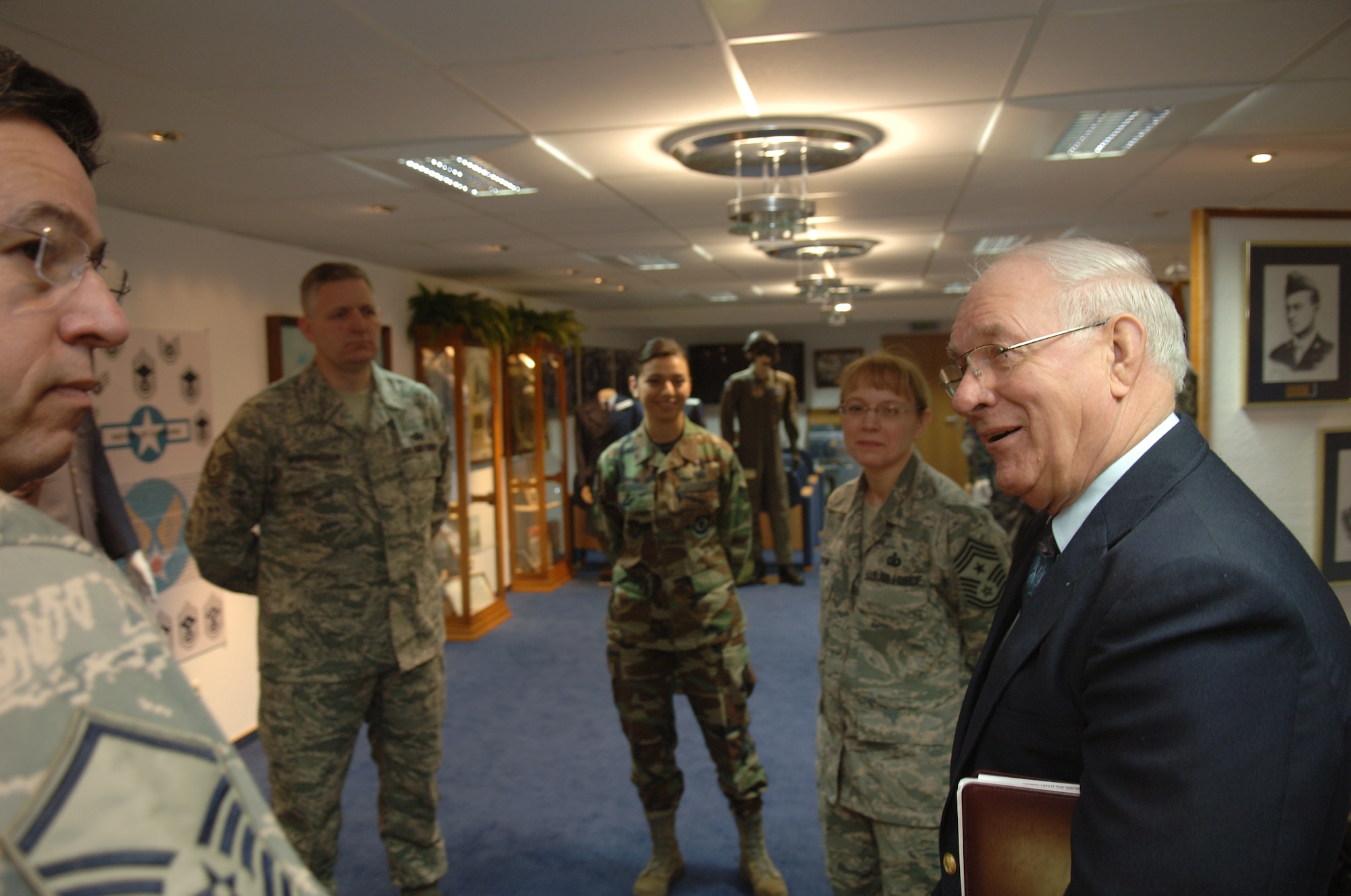 Retired Chief Master Sgt. of the Air Force Sam E. Parish visits with members of the U.S. Air Forces in Europe Enlisted Heritage committee at Ramstein Air Base Jan. 22, 2009. One of the committee’s responsibilities is to maintain the Chief Master Sgt. of the Air Force Sam E. Parish Enlisted Heritage room located inside the USAFE Headquarters building. (U.S. Air Force photo by Senior Airman Levi Riendeau)