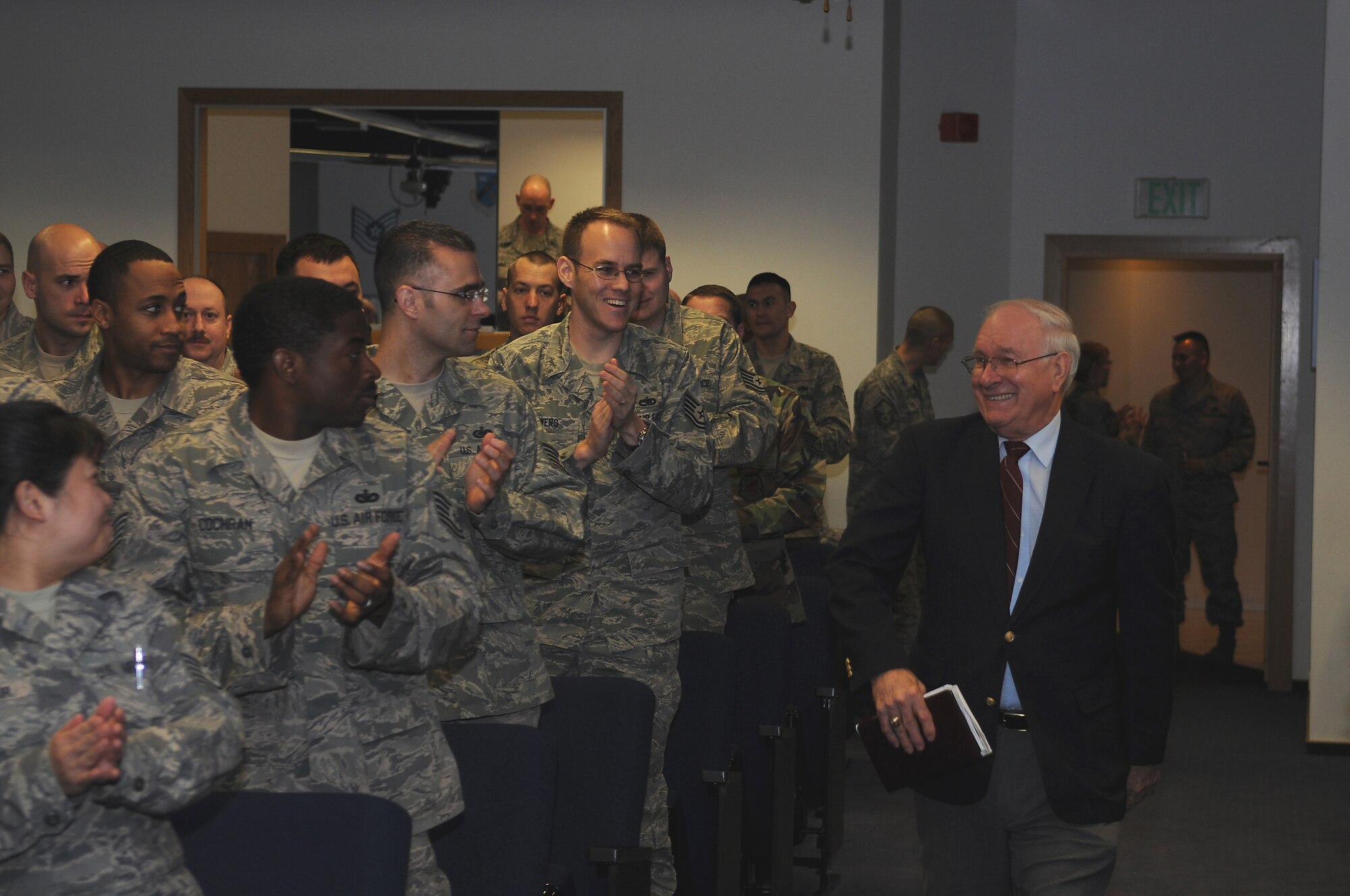 Non-commissioned officer academy students welcome retired Chief Master Sgt. of the Air Force Sam E. Parish during a visit to Kapaun Air Station, Germany, Jan. 23 2009. (U.S. Air Force photo by Airman 1st Class Caleb Pierce) 