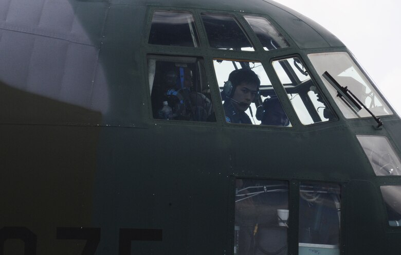 ANDERSEN AIR FORCE BASE, Guam -- A C-130 pilot from the Japan Air Self Defense Force taxis his aircraft on Andersen's flightline Jan. 27 for participation in Exercise Cope North 09-1.  More than 60 JASDF members arrived in three C-130s to participate in Exercise Cope North 09-1, a regularly scheduled exercise scheduled for Feb. 2-13.  Cope North is designed to enhance U.S. and Japanese air operations in defense of Japan. The Cope North exercise is one of the longest-running series of exercises in the Pacific theater.  Since the first Cope North exercise in 1978, thousands of American and Japanese personnel have honed skills that are vital to maintaining a high level of readiness.  The exercise has been in the planning stages for several months and bears no connection to any real-world events.  This will be the tenth time the United States and Japan have held a Cope North exercise on Guam, and it will be the fourth time that the JASDF will use live ordnance.  (U.S. Air Force photo by Senior Airman Ryan Whitney)