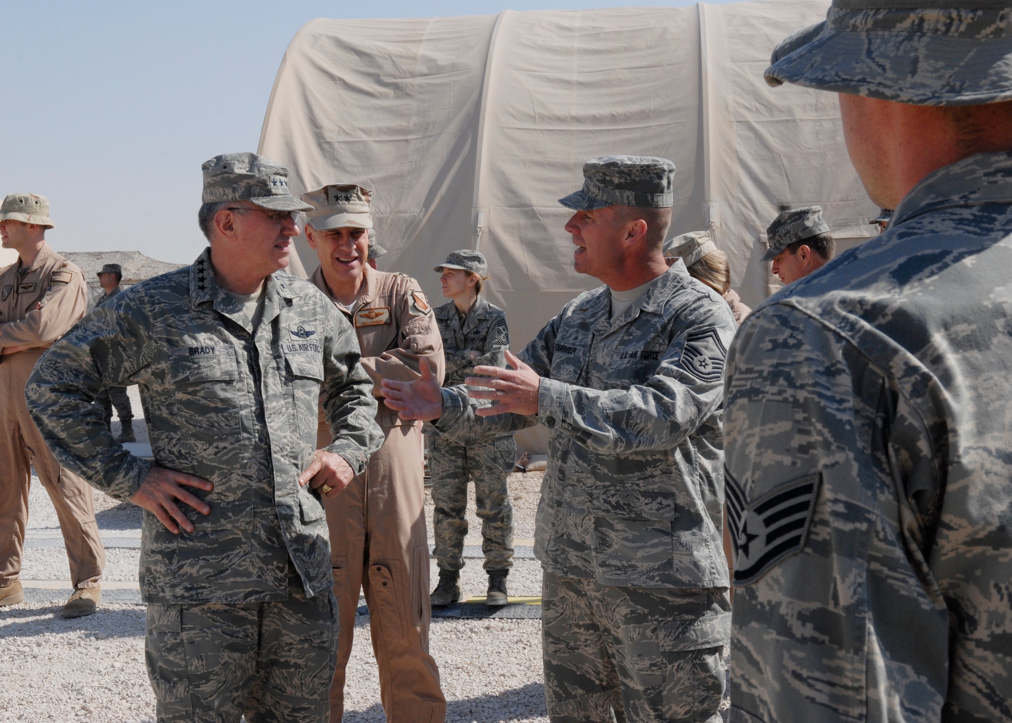 Senior Master Sgt. Gregory Fournier, 603rd Air Control Squadron, briefs Gen. Roger Brady, U.S. Air Forces in Europe commander, about the distinctive capabilities his deployed unit, the 71st Expeditionary Air Control Squadron, brings to the fight in support of Iraqi and Enduring Freedom and Joint Task Force- Horn of Africa.  General Brady visited the 71st EACS during his visit to Southwest Asia on Jan. 14.  (U.S. Air Force Photo by Airman 1st Class Andrew Satran/Released)