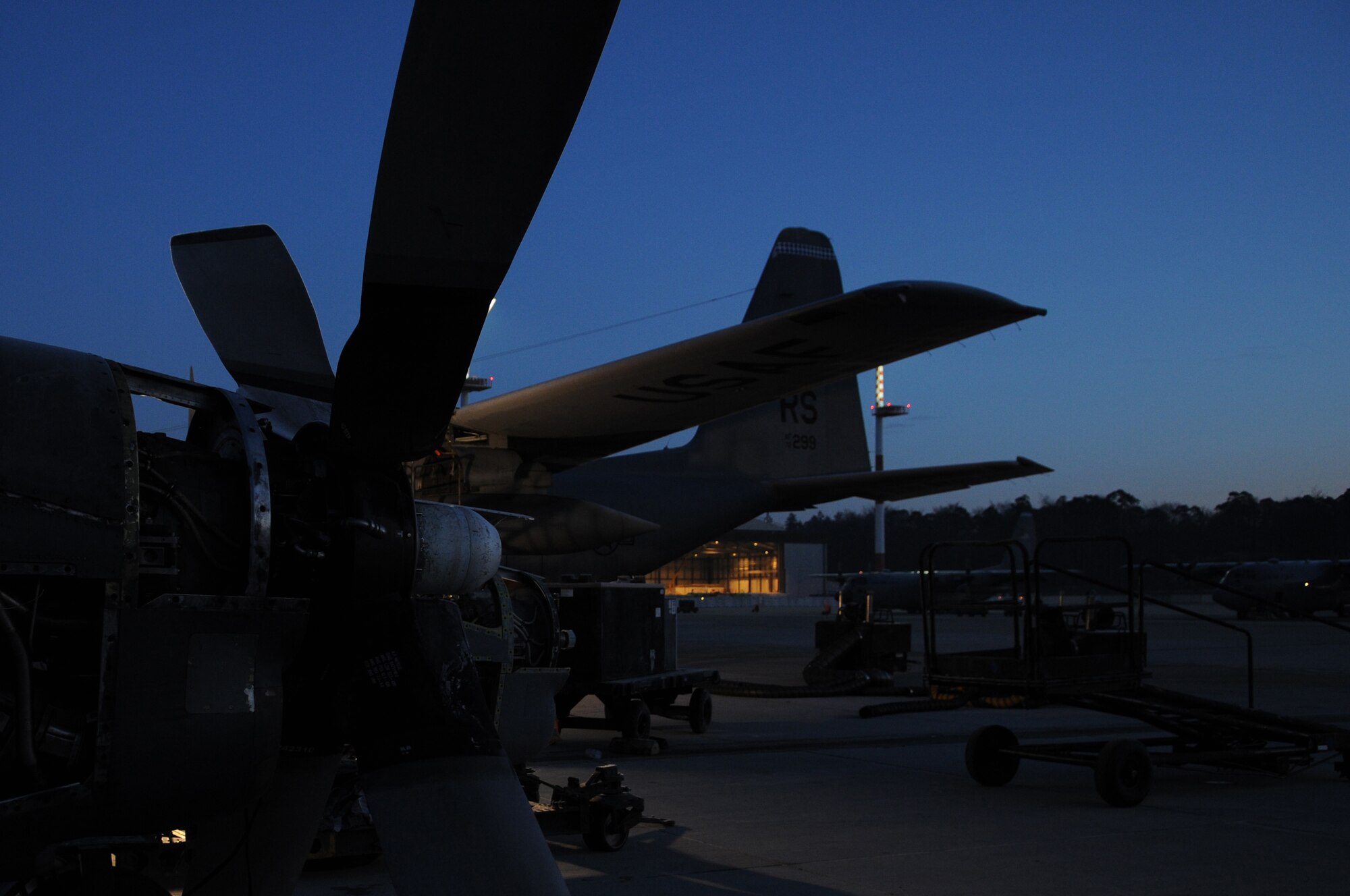 The 86th Aircraft Maintenance Squadron replaces an engine on a C-130 Hercules at Ramstein Air Base Jan. 22, 2009, in preparation for the next mission. (U.S. Air Force photo by Airman 1st Class Caleb Pierce) 