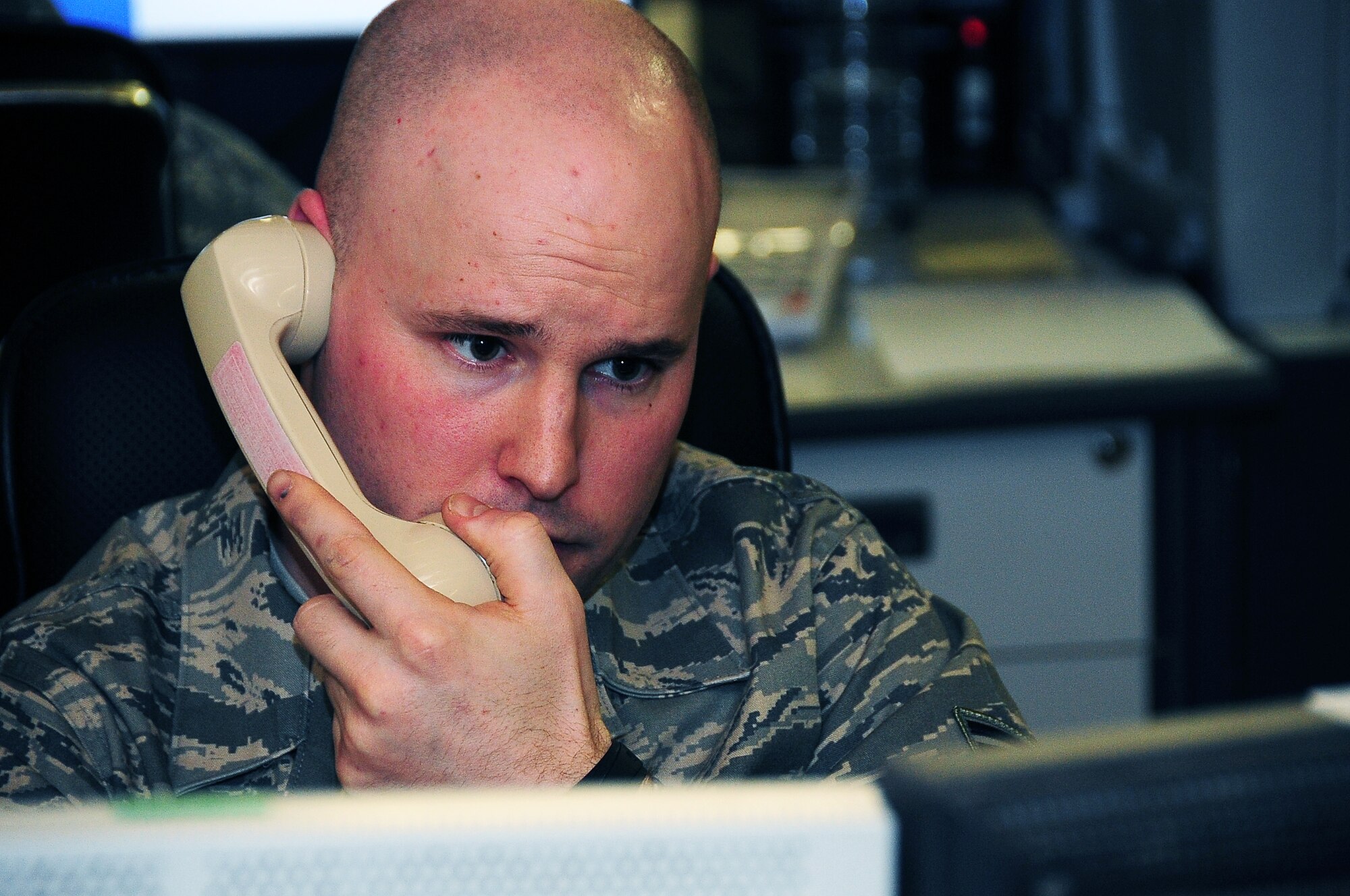 ALI BASE, Iraq –Staff Sgt. Jesse Barna, 727th Expeditionary Air Control Squadron, monitors radar and radio signals at Ali Base, Iraq, Jan. 26.  The 727th EACS works with Balad Air Base to provide radar and radio transmissions to aircraft on patrol in southern Iraq. (U.S. Air Force photo/Staff Sgt. Christopher Marasky)