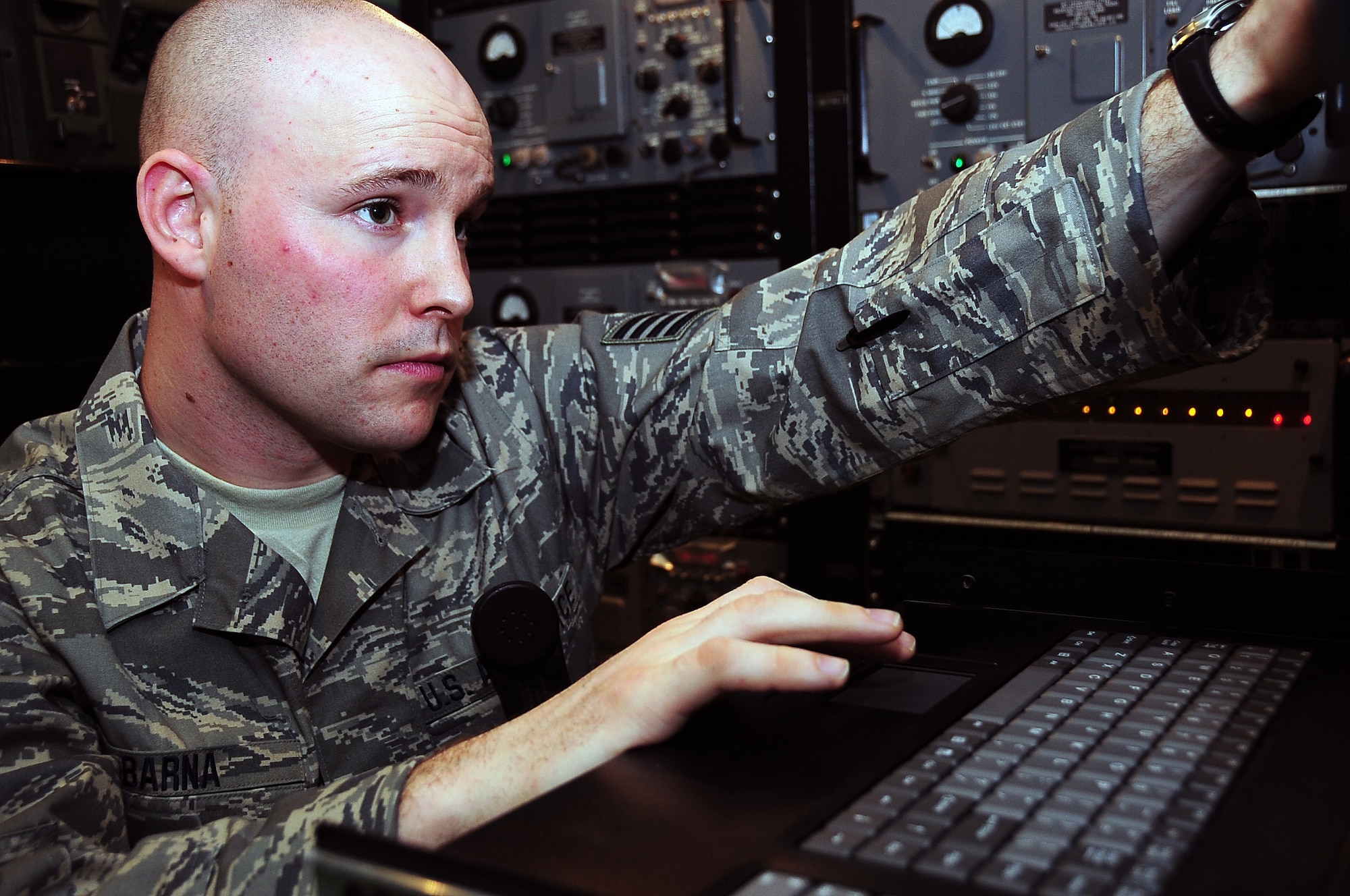 ALI BASE, Iraq –Staff Sgt. Jesse Barna, 727th Expeditionary Air Control Squadron, checks the transmission equipment at Ali Base, Iraq, Jan. 26.  The 727th EACS works with Balad Air Base to provide radar and radio transmissions to aircraft on patrol in southern Iraq. (U.S. Air Force photo/Staff Sgt. Christopher Marasky)