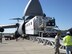 Travis aircrews and Boeing employees offload Wideband Global SATCOM Spacecraft from a C-5 Galaxy Jan. 21 at the Kennedy Space Shuttle Landing Facility, Cape Canaveral Air Force Station, Fla. Members of the 22nd Airlift Squadron aircrew first departed Travis and met with Boeing employees in Southern California where the spacecaft was uploaded then flown to Kennedy Space Center.  Due to the fragile nature of the $350 million spacecraft, the equipment was offloaded immediately by a pre-positioned offload team. The equipment is part of the Atlas 5 Rocket Mission set to launch March 9. 

