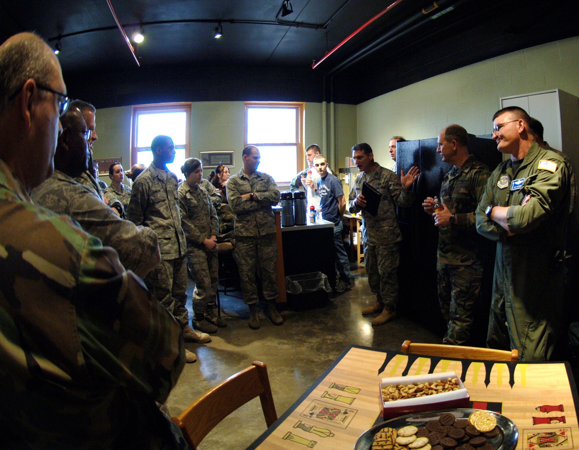 MCCONNELL AIR FORCE BASE, Kan. – Capt. (Ch) Robert Borger, 22nd Air Refueling Wing, briefs Team McConnell members on the new addition to dorm 350 spiritual den, Jan. 23. Chaplain Borger and a team of Airmen created a spiritual den on the first floor of dorm 350 as a place for Airmen to come and interact, while receiving spiritual guidance from other Airmen and chaplain assistants. (Photo by Senior Airman Laura Suttles) 