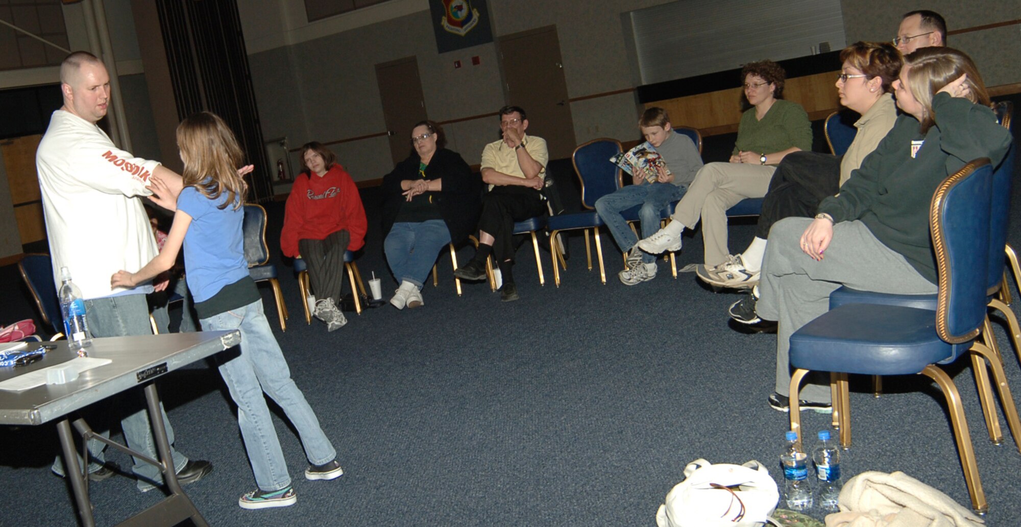 MCCONNELL AIR FORCE BASE, Kan. -- Jason Griffith, 22nd Security Forces Squadron, teaches self-defense tactics to McConnell members during the Safety 101 Protecting Yourself, Family and Home class at the Robert J. Dole Community Center, Jan. 22. The class covered situational awareness, child safety and assault scenarios. (Photo by Airman 1st Class Maria Ruiz)
