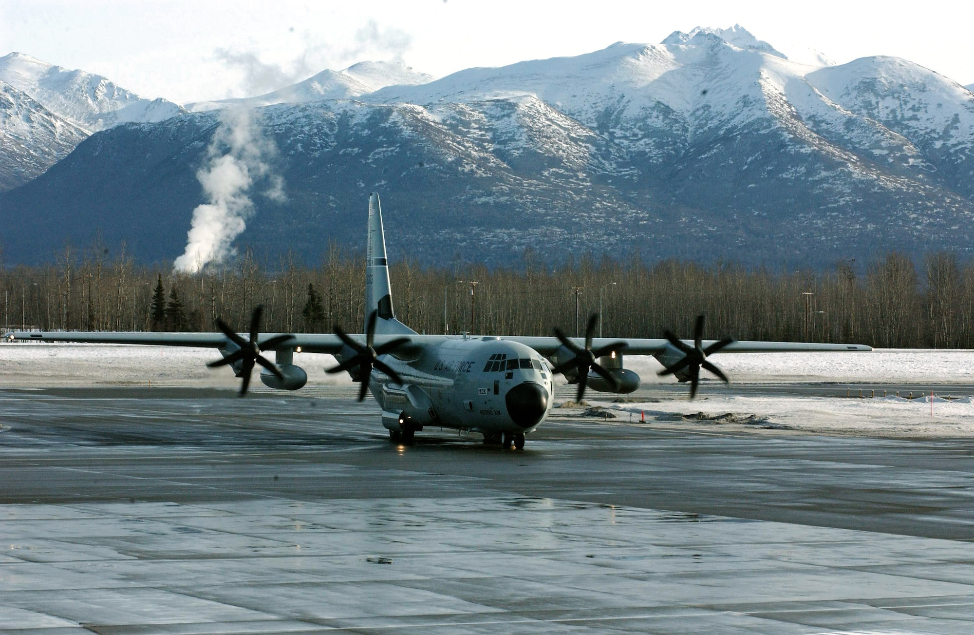 A WC-130J readies for takeoff at Elmendorf Air Force Base, Alaska. Reserve Hurricane Hunters of the 403rd Wing from Keesler AFB, Miss., deployed for a month to collect weather data ahead of pending winter storms. The data they collect increases the accuracy of the National Weather Service forecast by 10 to 20 percent. (U.S. Air Force photo/Tech. Sgt. James B. Pritchett) 
