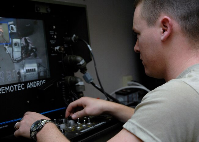 Staff Sgt. Bryan Worley operates the Robot F6A Jan. 26 on Charleston AFB. The robot is used to investigate and render safe improvised explosive devices from a distance. Sergeant Worley is an explosive ordnance technician with the 437th Civil Engineer Squadron. (U.S. Air Force photo/Senior Airman Katie Gieratz) 