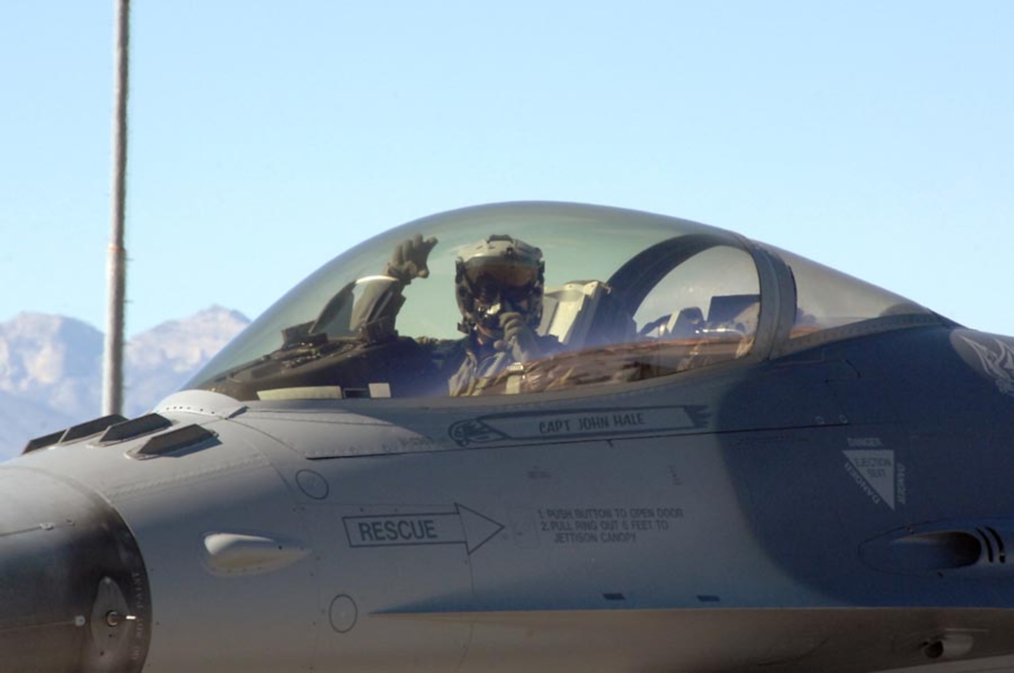 NELLIS AIR FORCE BASE, Nev. -- An F-16CJ fighter pilot assigned to the 79th Fighter Squadron, Shaw AFB, S.C., taxis out for a training mission during Red Flag 09-2 at Nellis AFB, Nev., Jan. 27. Red Flag is a multi-national exercise providing a realistic environment to practice combat scenarios. The experience gained during the exercise is vital to the survival of pilots in combat. (U.S. Air Force photo/2nd Lt. Noelle Caldwell)   