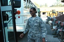 EGLIN AIR FORCE BASE, Fla. - Outside the base logistics readiness center here Monday, Senior Airman Tracey Horne-Jones, 711th Special Operations Squadron, boards a bus headed for the flightline and an awaiting transport aircraft. Embarking on her first-ever deployment, Airman Horne-Jones joined dozens of fellow reservists from the 919th Special Operations Wing at Duke Field in deploying to support Operation Enduring Freedom. (U.S. Air Force Photo by Senior Airman James P. Brock III)