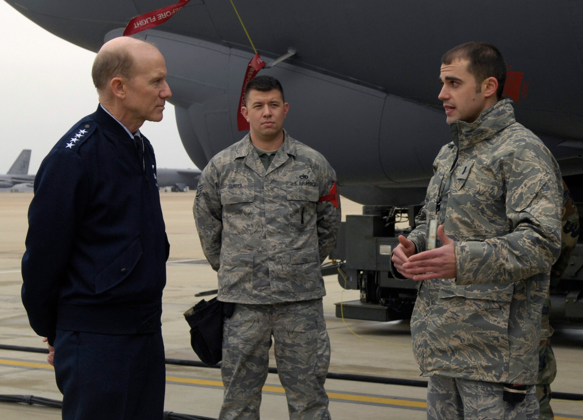 1st Lt. Zach Myhra, 96th Aircraft Maintenance Unit assistant officer in charge, briefs Gen. John D. W. Corley, Air Combat Command Commander, on the nuclear capability and stewardship of our most lethal weapons and health of our B-52H Stratofortress fleet while Staff Sgt. Robert Gunter, 96th Aircraft Maintenance Unit load team chief awaits patiently to brief the general as well. General Corley spoke to many Airmen on his visit to Barksdale to have a feel for what we need to improve at the 2d Bomb Wing. (Senior Airman Alexandra M Sandoval/U.S. Air Force)