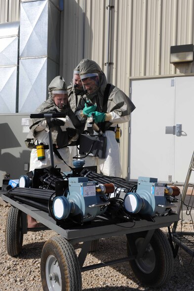 DYESS AIR FORCE BASE, Texas -- Team members from the CBRNE Challenge try to determine when fallout from a potential nuclear bomb would arrive. The challenge is a competition that tests the Airmen on chemical, biological, readiness, nuclear and explosive incidents. (U.S. Air Foce photo by Senior Airman Domonique Simmons)