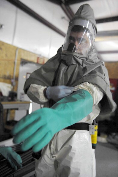 DYESS AIR FORCE BASE, Texas -- A Team member from the CBRNE Challenge prepares to go outside to determine when fallout from a potential nuclear bomb would arrive. The challenge is a competition that tests the Airmen on chemical, biological, readiness, nuclear and explosive incidents. (U.S. Air Foce photo by Senior Airman Domonique Simmons)