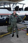 Lt. Col. Rich Lowe, 39th Flying Training Squadron, poses after exiting a T-6A Texan II after a flight Jan. 28. Colonel Lowe pulled several people from the wreckage of Continental Airlines Flight 1404 that crashed on take-off at Denver International Airport on Dec. 20, 2008. (U.S. Air Force photo by Rich McFadden)