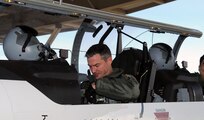 Lt. Col. Rich Lowe, 39th Flying Training Squadron, exits a T-6A Texan II after a flight Jan. 28. Colonel Lowe pulled several people from the wreckage of Continental Airlines Flight 1404 that crashed on take-off at Denver International Airport on Dec. 20, 2008. (U.S. Air Force photo by Rich McFadden)
