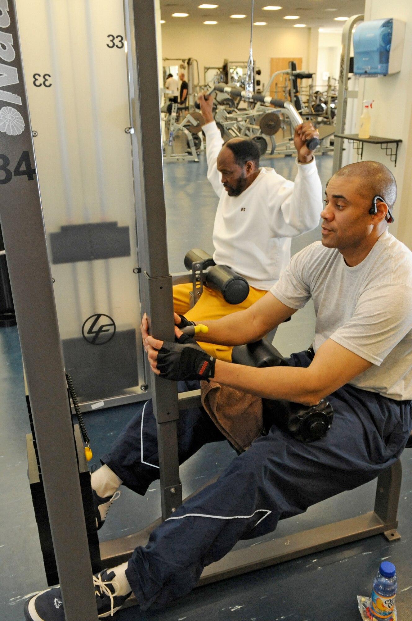 Retired Master Sgt. William Fantroy and Reservist Tecb. Sgt. John Fielding, 514th Maintenance Operations Flight maintenance scheduler, take full advantage of the Fitness Center and all that it has to help stay physically fit. The Fitness Center staff are trained fitness/sports specialists and are able to provide equipment orientation and prepare custom workout programs, all free of charge. (U.S. Air Force photo/Wayne Russell)
