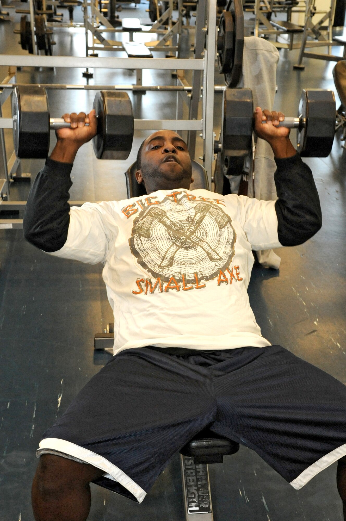 Staff Sgt. Earl Williams, 305th Maintenance Operation Squadron, who recently returned from the desert, wastes no time getting back in the gym. He admits he loves to workout during the lull hours of 9 to 11 a.m. when there are the least amount of people in the waiting to use the equipment. (U.S. Air Force photo/Wayne Russell)
