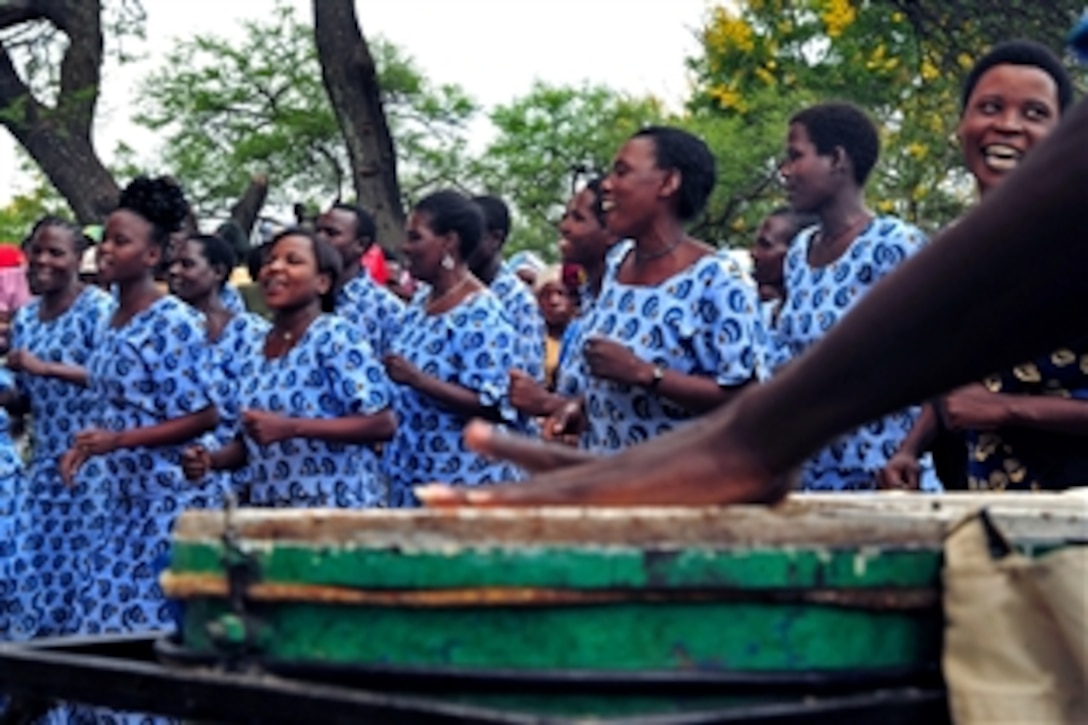 Residents sing and dance during the dedication ceremony for a water project  in Magu, Tanzania, Jan. 21, 2009. The project, which will bring clean drinking water to thousands of villagers, is a example of how the Combined Joint Task Force - Horn of Africa mission develops and nurtures partnerships to promote regional cooperation.