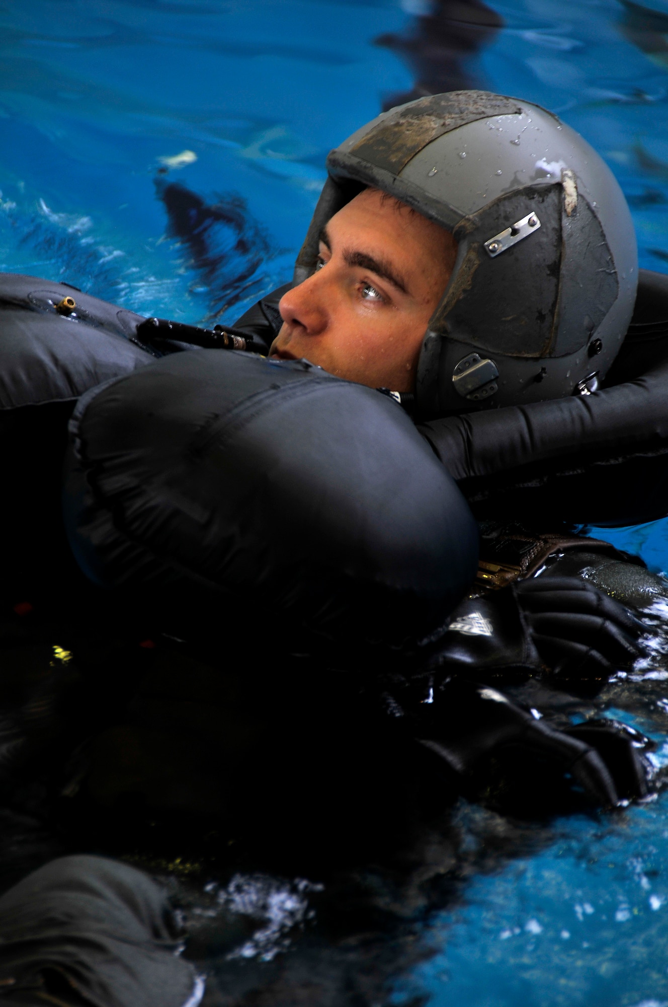 MISAWA AIR BASE, Japan -- Capt. Anthony Eschliman, 35th Aerospace Medicine Squadron, waits for instruction during water survivial training Jan. 21, 2009.  The training is conducted by Survival, Evasion, Resistance and Escape instructors annually.  (U.S. Air Force photo by Senior Airman Chad Strohmeyer)