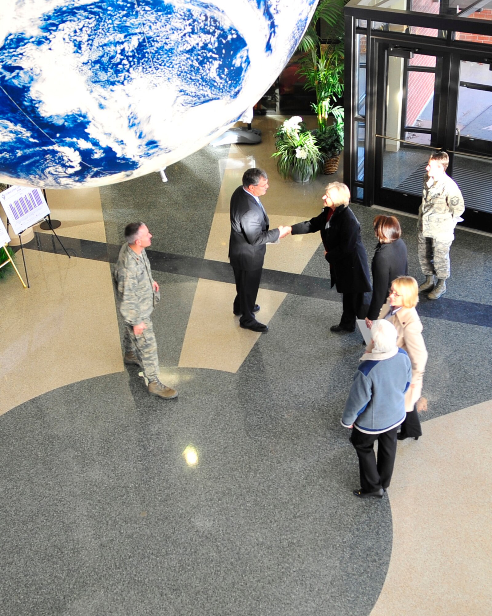 FAIRCHILD AIR FORCE BASE, Wash. – Kathy Scott, wife of 18th Air Force commander Maj. Gen. Winfield Scott, is greeted by Hank Pelella, Acting Director Base Education Center Jan 29. Ms. Scott visited multiple facilities on base including the FunSpot, Deel Community Center, and the Airman and Family Readiness Center. (U.S. Air Force photo / Airman 1st Class Melissa L. Barnett)
