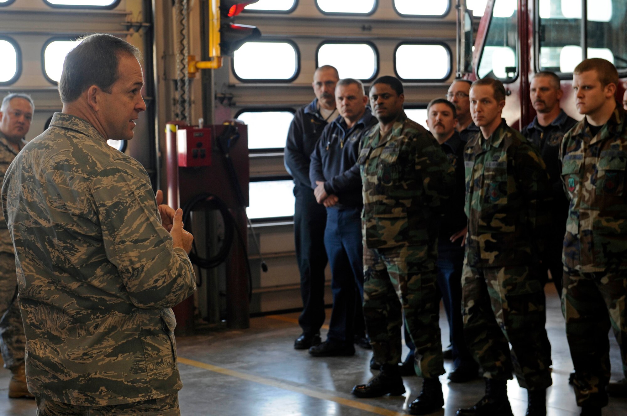 Brig. Gen. Timothy Byers, Air Combat Command Installations and Mission Support director, speaks with members of the 28th Civil Engineer Squadron fire department here, Jan. 27. General Byers leads ACC 's base and expeditionary combat support activities for civil engineering, security forces and contracting. (US Air Force photo/Airman 1st Class Corey Hook)