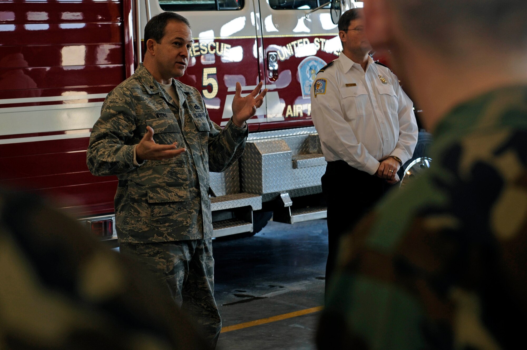 Brig. Gen. Timothy Byers, Air Combat Command Installations and Mission Support director, speaks with members of the 28th Civil Engineer Squadron fire department here, Jan. 27. General Byers visited numerous squadrons on base to obtain a firsthand perspective of the personnel who work on Ellsworth. (US Air Force photo/Airman 1st Class Corey Hook)