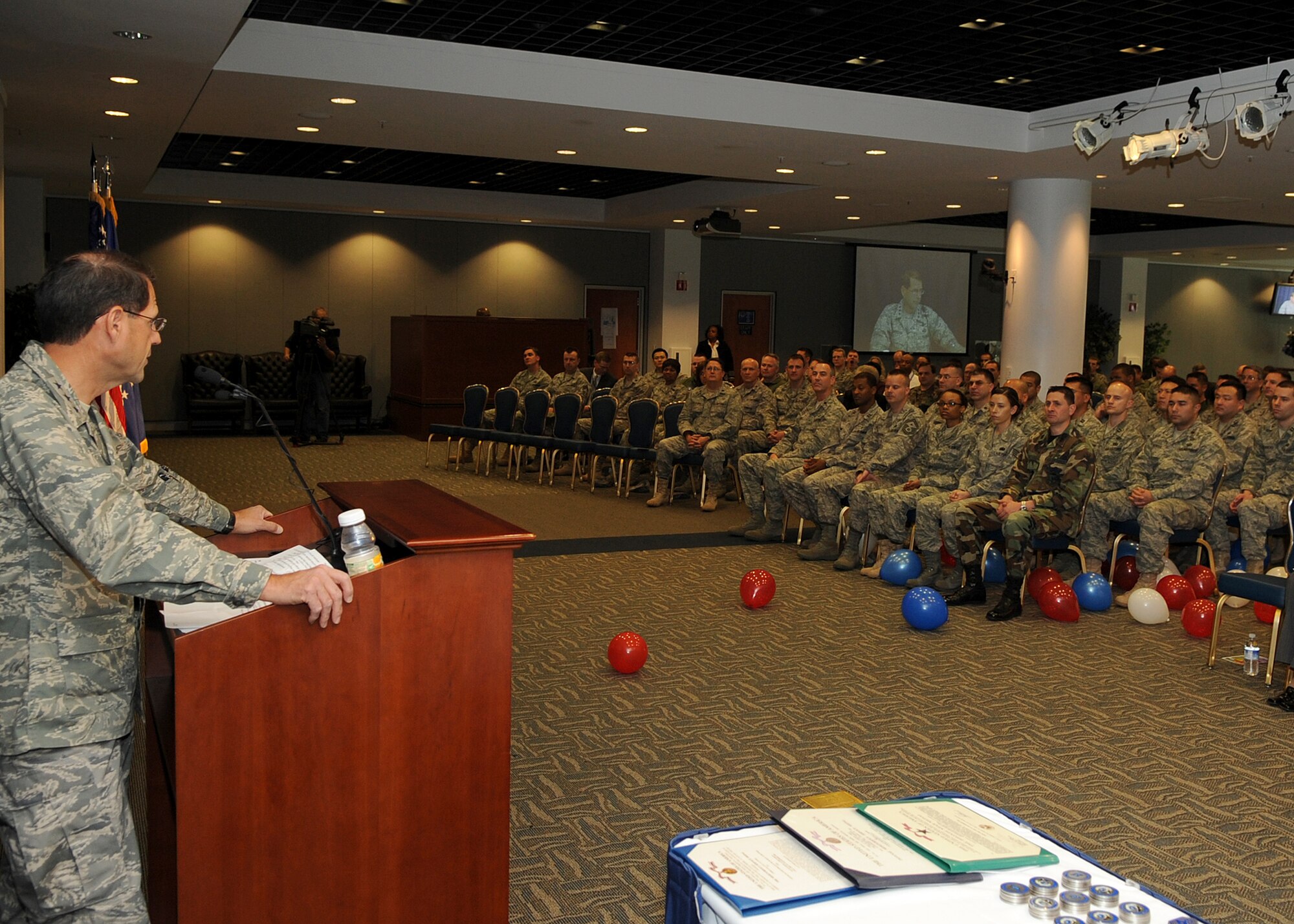 Lt. Gen. Tom Sheridan, Space and Missile Systems Center commander, thanks and welcomes home airmen who recently returned from deployment during the opening remarks of the "SMC Welcome Home Airmen Celebration" at the Gordon Conference Center, Jan. 29. (Photo by Stephen Schester)