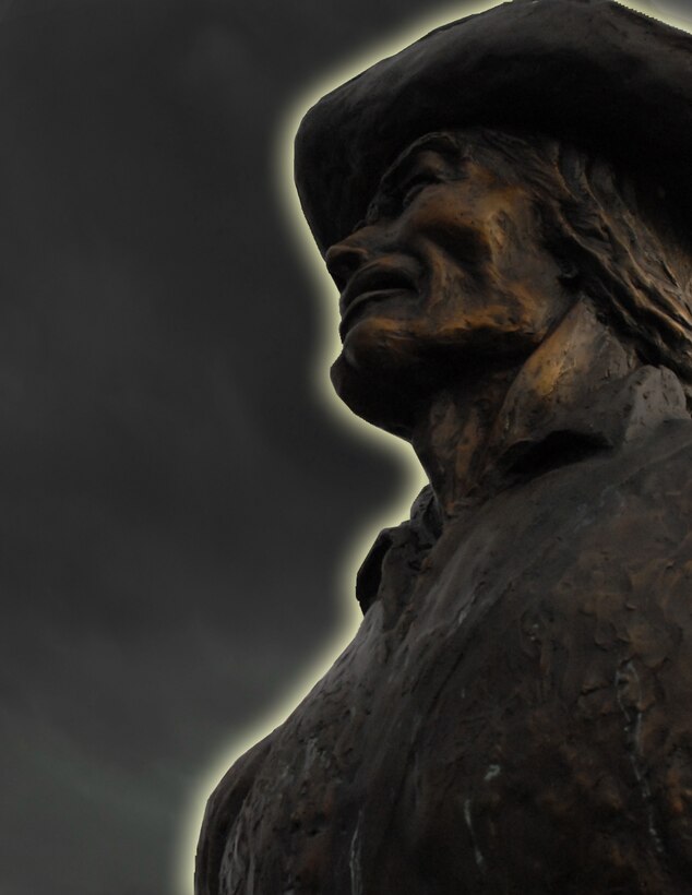 As throughout history, the Minuteman stands ready in spite of stormy skies. (photo illustration by SrA Jake Meyer)