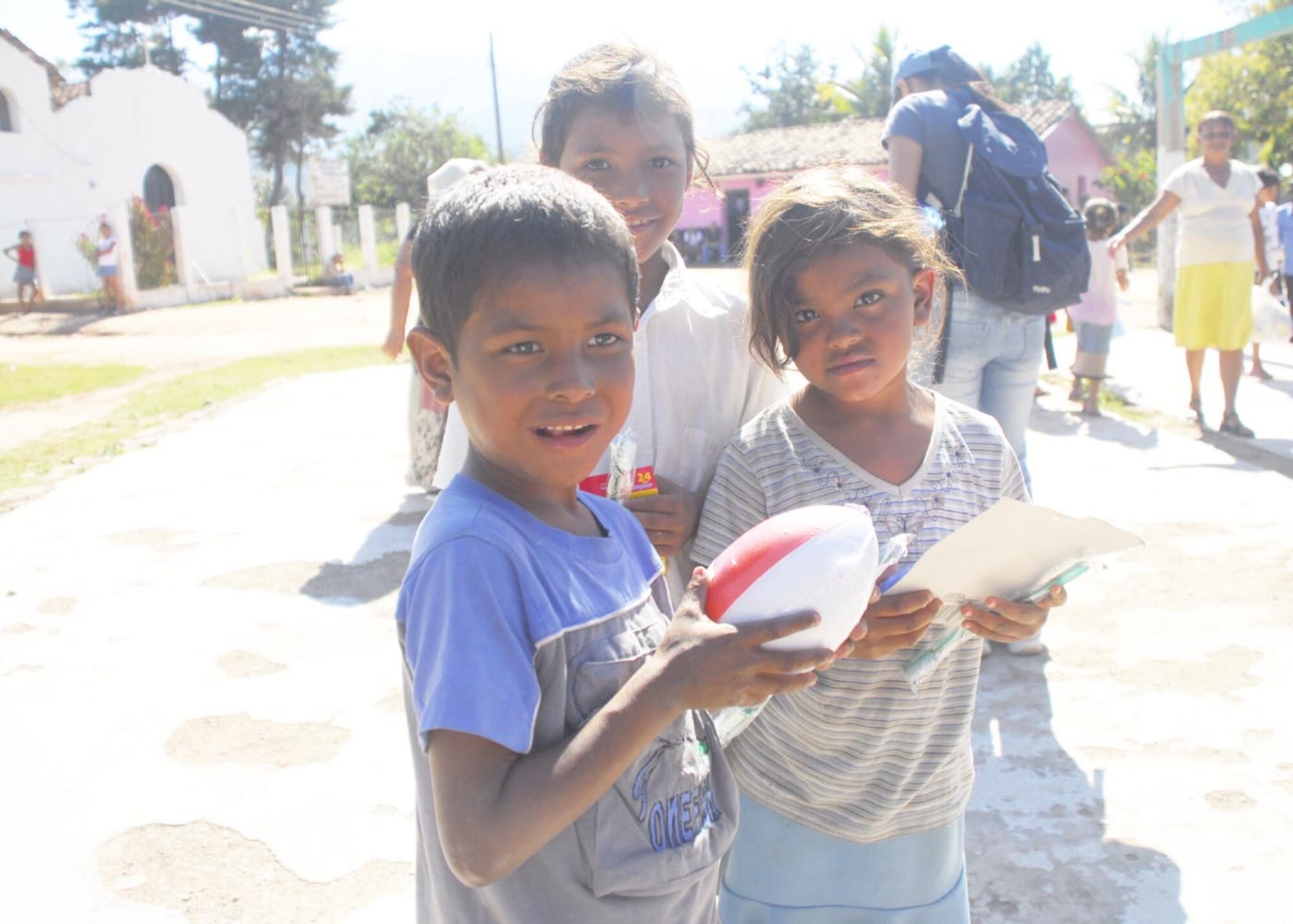 SOTO CANO AIR BASE, Honduras - More than 80 men and women from Joint Task Force-Bravo here brought toys and food to share with the children of El Sitio, Honduras, Jan. 24, during a chapel hike outside Comayagua.  (US Air Force photo/Tech. Sgt. Rebecca Danét)