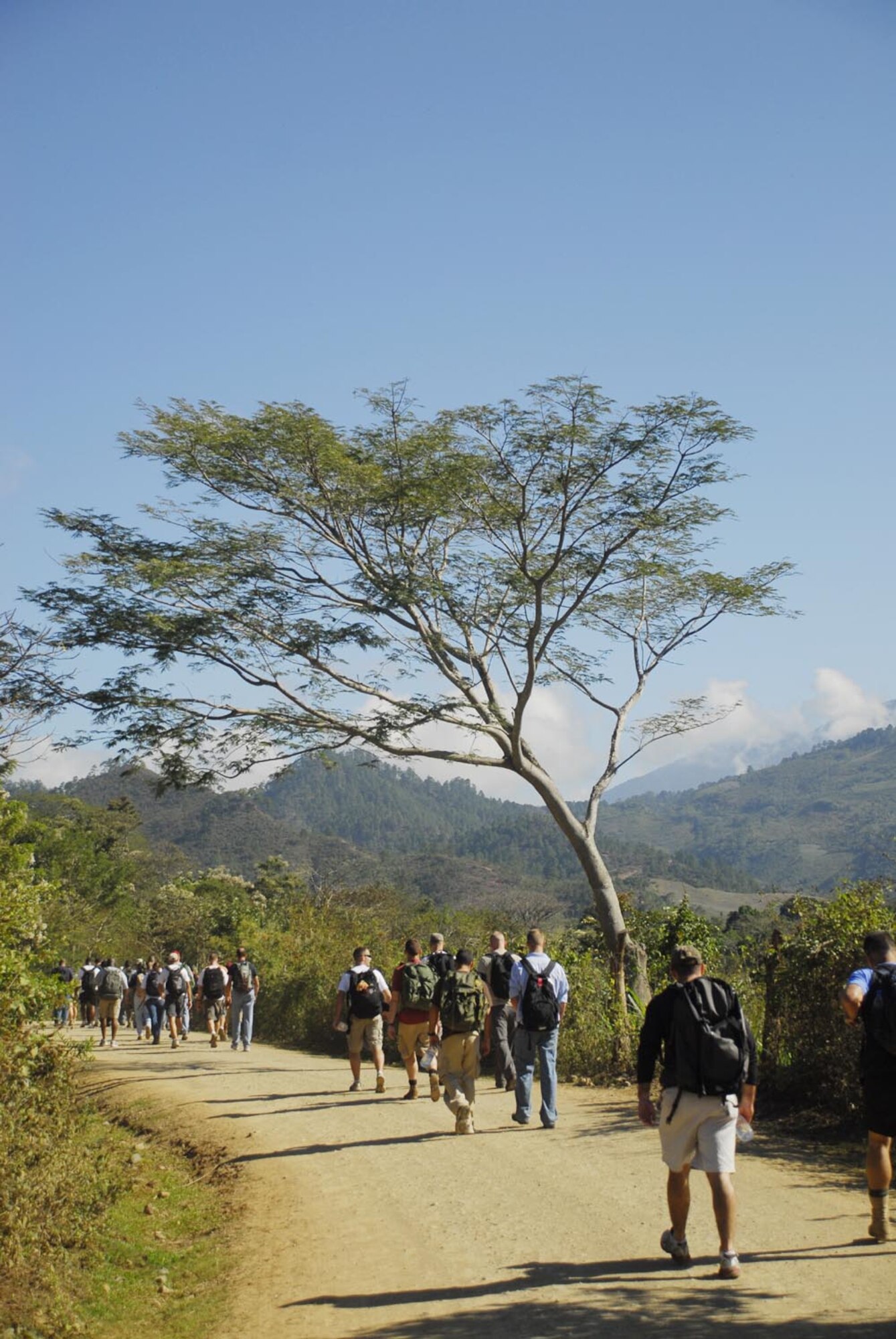 SOTO CANO AIR BASE, Honduras - More than 80 men and women from Joint Task Force-Bravo here hike into the hills outside Comayagua, Honduras, Jan. 24 to bring food and toys to the people who live there. (US Air Force photo/Tech. Sgt. Rebecca Danét)