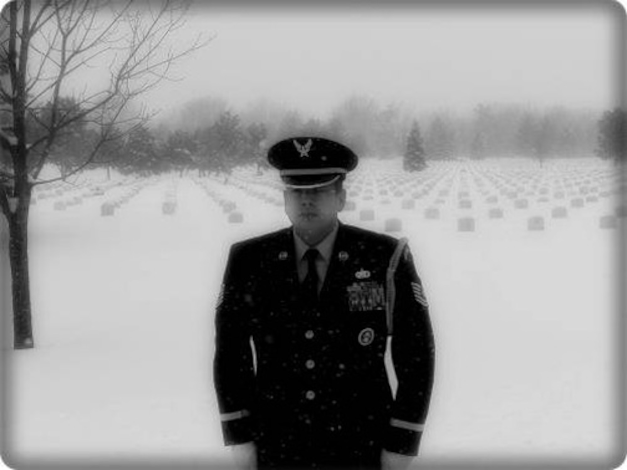TEAM BUCKLEY WARRIOR OF THE WEEK -- Tech. Sgt. Edward Wise, Non-Commissioned Officer in Charge of the Mile High Honor Guard, stands at attention at Fort Logan National Cemetery during retiree military funeral honors. Sgt. Wise is Team Buckley's Warrior of the Week for Jan. 30 - Feb. 5. When he is not honoring our fallen Soldiers, Sailors, Airmen and Marines, Sgt. Wise enjoys spending free time with his family, camping, fishing and four-wheeling. (Courtesy photo)
