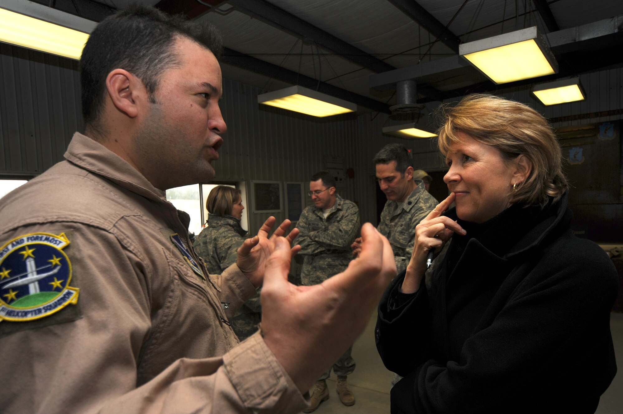 Ms. Elisabeth Bumiller, New York Times reporter, interviews Tech. Sgt. Onnez Rodriguez-Massas, from Andrews Air Force Base, Md., about his upcoming deployment during an Air Advisor Course, hosted by the U.S. Air Force Expeditionary Center, at a range on Fort Dix, N.J., Jan. 27.  The Air Advisor Course is a combined effort between USAFEC, AETC, AFCENT and contractors to prepare Airmen deploying to Iraq and Afghanistan to train air force members in those countries.  (U.S. Air Force Photo/Staff Sgt. Nathan Bevier)