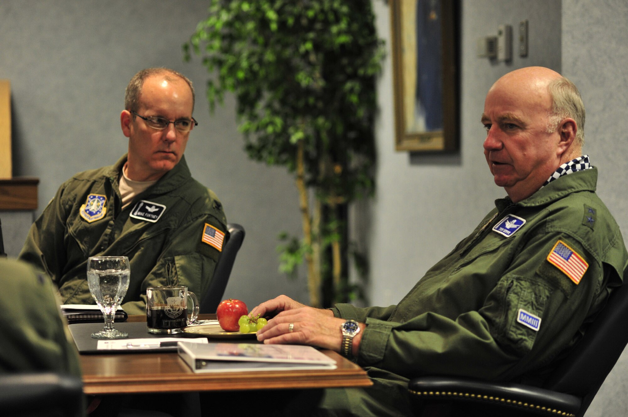 Col. Michael Fortney, 341st Missile Wing commander, listens as Maj. Gen. Thomas Deppe, Air Force Space Command vice commander, answers a question duirng a wing update briefing Jan. 23. (U.S. Air Force photo/John Turner)