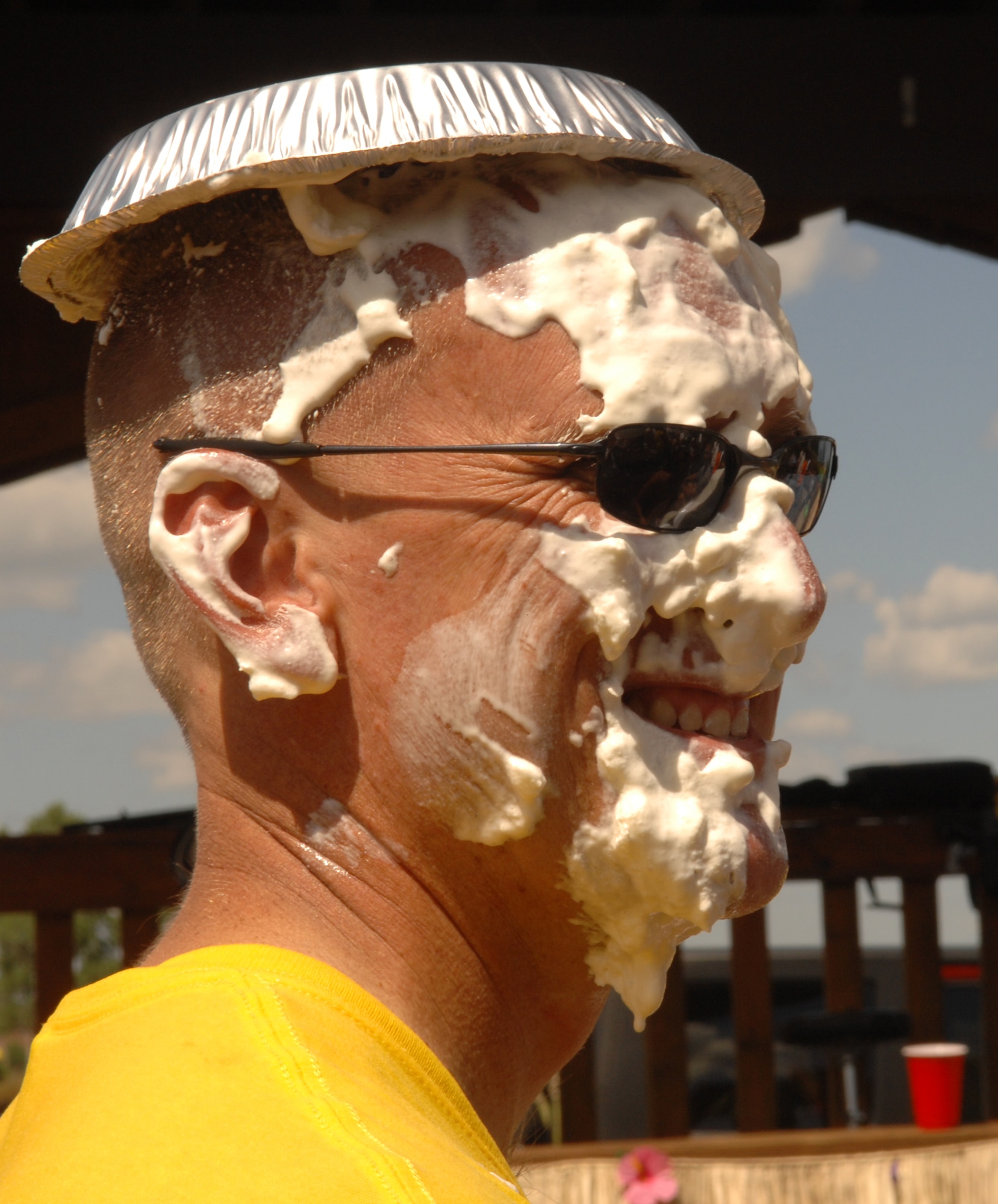 WHITEMAN AIR FORCE BASE, Mo. – Chief Master Sgt. Brian Hornback sports a new hat trend following a pie in the face contest at the Atomic Luau Aug. 8. Airmen were able to donate money for the luau and vote for members of Team Whiteman leadership to receive a pie in the face. (U.S. Air Force photo/Senior Airman Jessica Snow)   