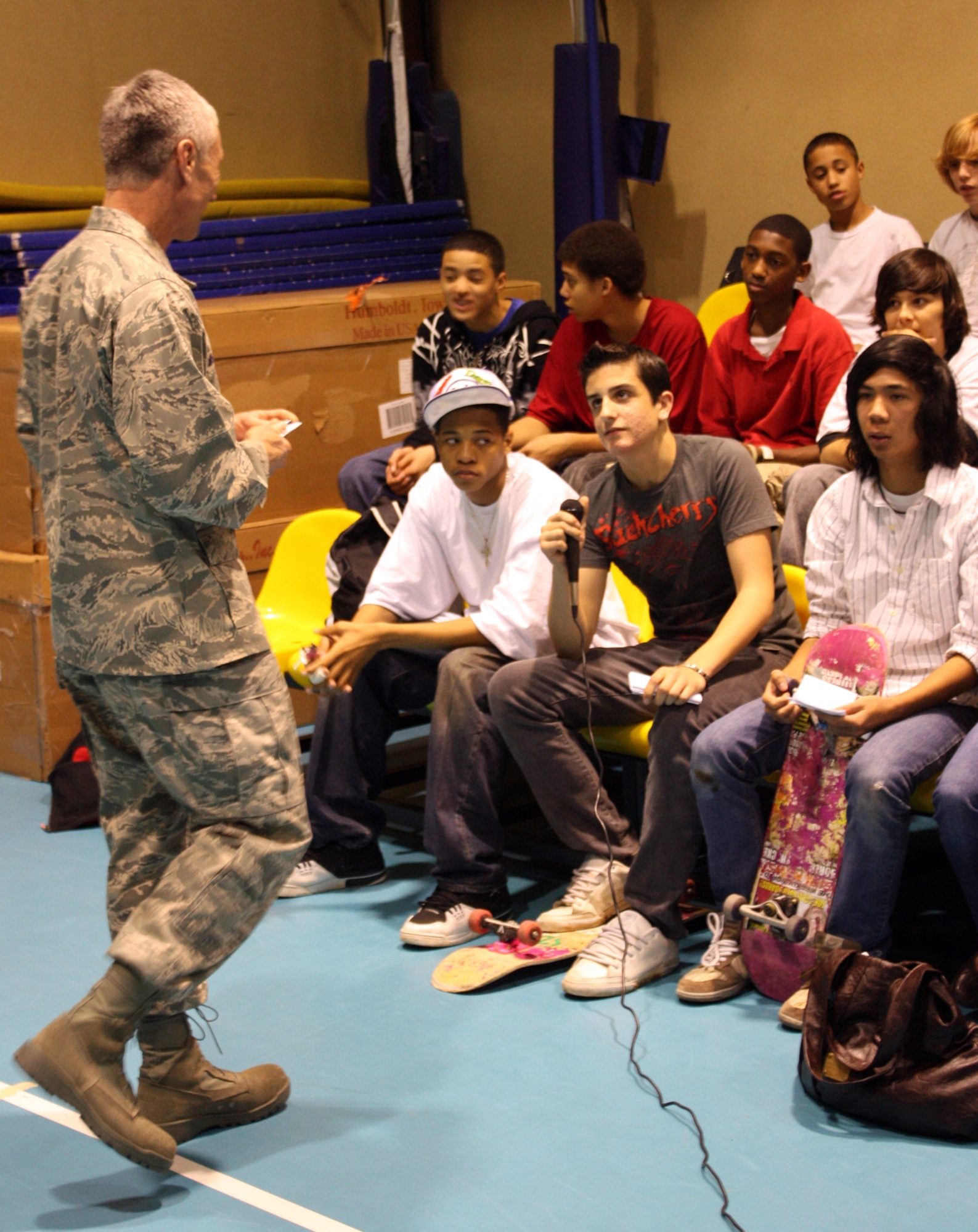 Col. Phil McDaniel, 39th Air Base Wing commander, listens to Mr. Rick Schott's questions about  the youth center skate park during a teen town hall meeting at Incirlik's youth center Jan.28. (U.S. Air Force photo by Staff. Sgt. Christopher Galindo)
