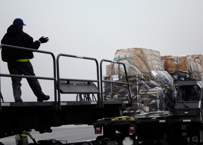 A Copperhead Tigershark Unmanned Air Vehicle System is loaded onto a Charleston C-17 Globemaster III by an Aerial Port Squadron civilian Jan. 26. The UAV system is used in theater to support the warfighter. (U.S. Air Force photo/Senior Airman Katie Gieratz)
