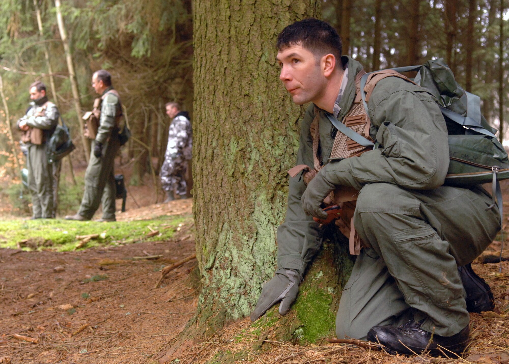 SPANGDAHLEM AIR BASE, Germany-- Staff Sgt. Robert Martin, 52nd Operations Support Squadron, demonstrated proper evading procedures during Combat Survival Training, Jan. 26, 2008. The CST program is a fast paced two-day refresher course that provides pilots with the skills to return home. (U.S. Air Force photo by Airman Staci Miller)